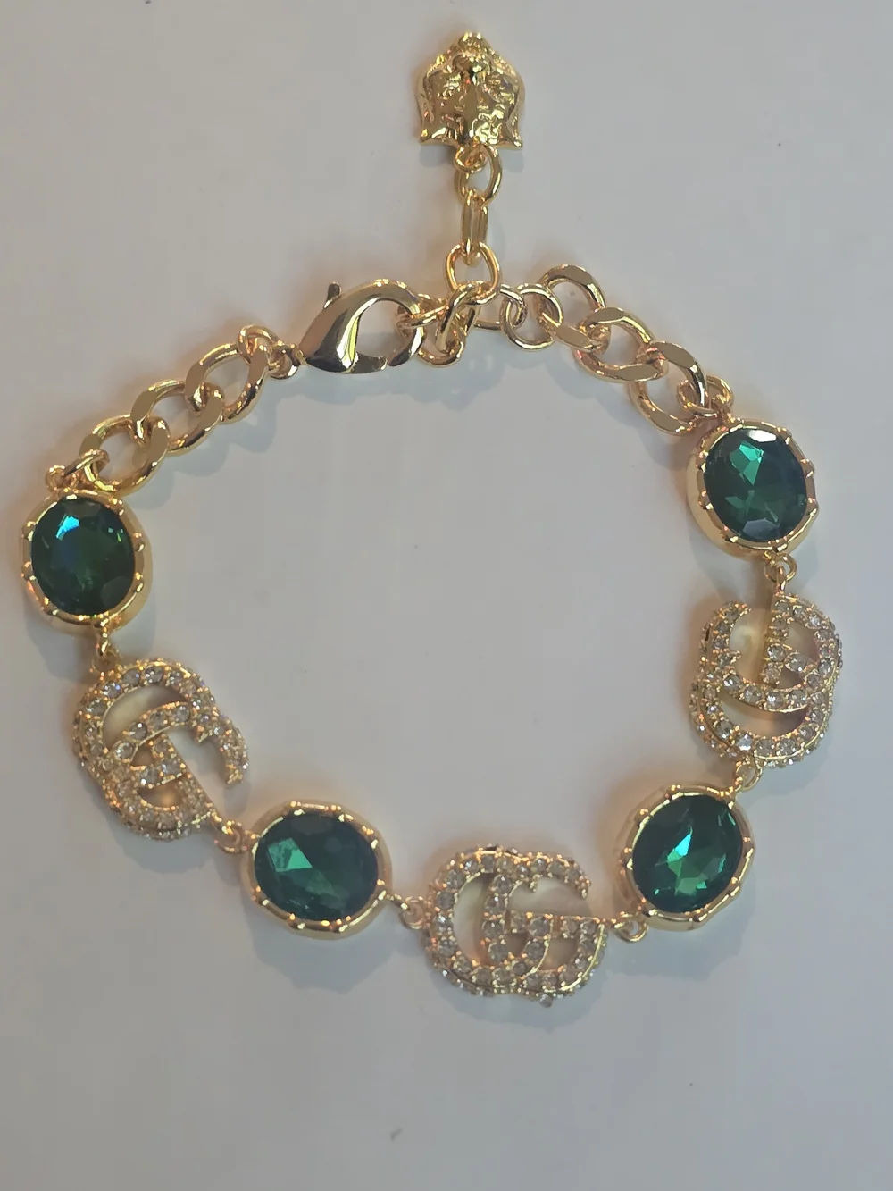 Gucci 18kgp GG Gold-Tone Bracelet with Emerald Green Crystal Accents